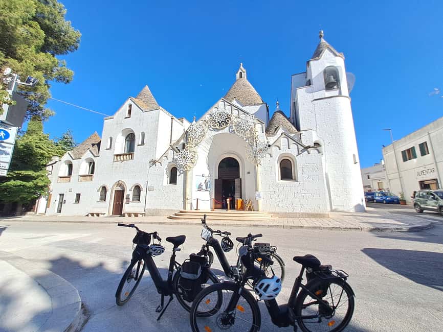 Alberobello: Guided e-bike tour + mill & donkey farm - Alberobello trulli views and photo stops on the way back