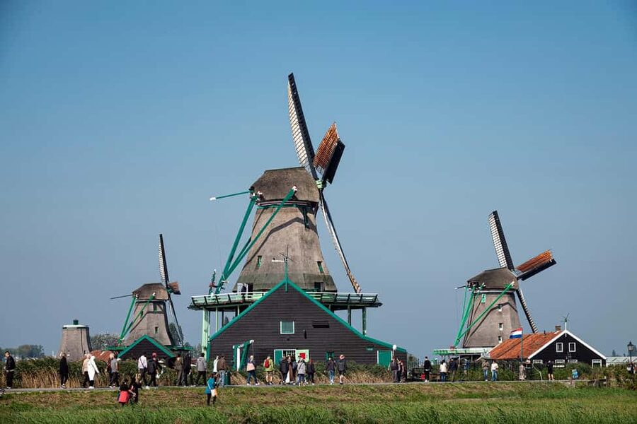 Amsterdam: Experience Zaanse Schans Windmills & Cheese Farm - Getting there from Amsterdam: quick, easy ferry + luxury coach