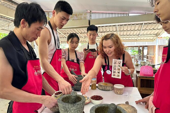 Authentic Thai Cooking Class and Farm Visit in Chiang Mai - Cooking in an Open-Air Kitchen: Where You Learn the Real Technique