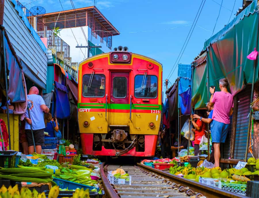 Bangkok: Private Floating & Railway Markets with Farm Visits - Maeklong Railway Market: walking the tracks without losing your footing