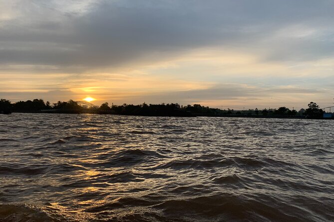 Cai Rang floating market, see sunrise, CaCao orchard, small canal - Sunrise on the Mekong: the part you remember long after photos fade