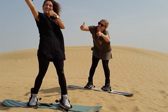 Dubai Desert Morning Tour in 4WD Vehicle: Camel Ride, Quad Bike Tour, Sandboarding, and Camel Farm - Entering the Dubai desert early in a 4x4 jeep