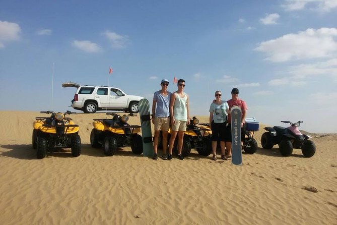Dubai Desert Morning Tour in 4WD Vehicle: Camel Ride, Quad Bike Tour, Sandboarding, and Camel Farm - Quad biking through the dunes: adrenaline with structure