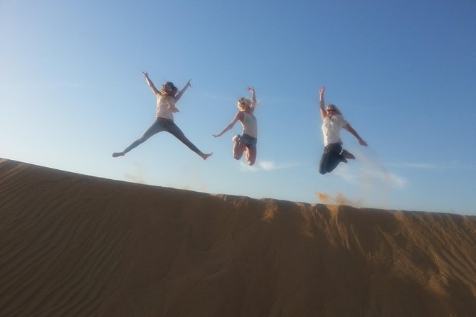 Dubai Desert Morning Tour in 4WD Vehicle: Camel Ride, Quad Bike Tour, Sandboarding, and Camel Farm - Guides, mobile photography, and the human touch