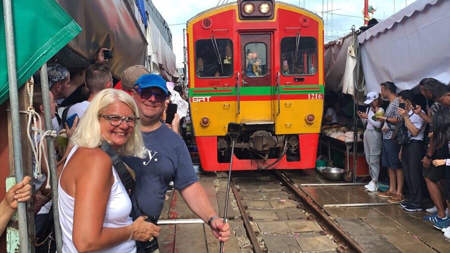 From Bangkok: Floating & Railway Markets Tour & Coconut Farm - Railway Market train ride: the real reason this stop feels thrilling