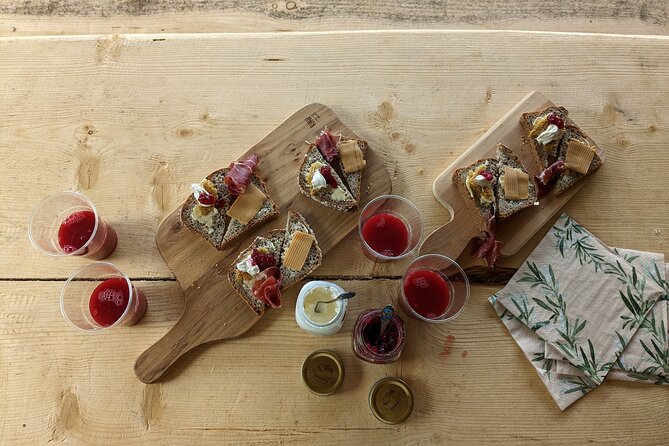 Guided Hiking tour on the Lands of Steim Farm in Vik, Norway - Snack platter in a traditional hut: local food with fjord-and-mountain views