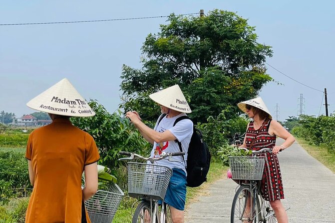 Hue Organic Farm Visit and Traditional Cooking Class - Madam Thu Farm: Planting, Watering, and Harvesting Naturally Grown Veggies