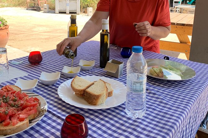 Kefalonia Farm Tour on E-Bikes - Stop 2 at Liocharis Olive Oil mill: varieties, tour, and tastings with Greek salad