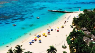 Marijuana Farm, Bamboo Rafting and Doctors Cave Beach Tour - Lethe: a bamboo rafting ride with reggae energy