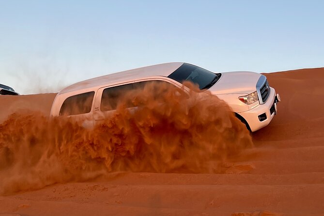 "Morning Desert Safari with Camel Farm visits & Arabic Treats" - Dune Bashing and Sandboarding: The Adrenaline Pair