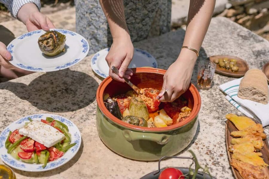 Naxos: Family Farm-table Cooking, Kouros Tour & Live Music - Kouros of Melanes guided visit while the meal cooks