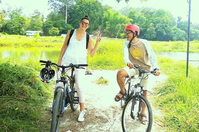 Yogyakarta Cycling Tour Around the Villages and Fish Farm - Start at Izzati Jogjatour: Bikes, Helmets, and a Quick Confidence Boost